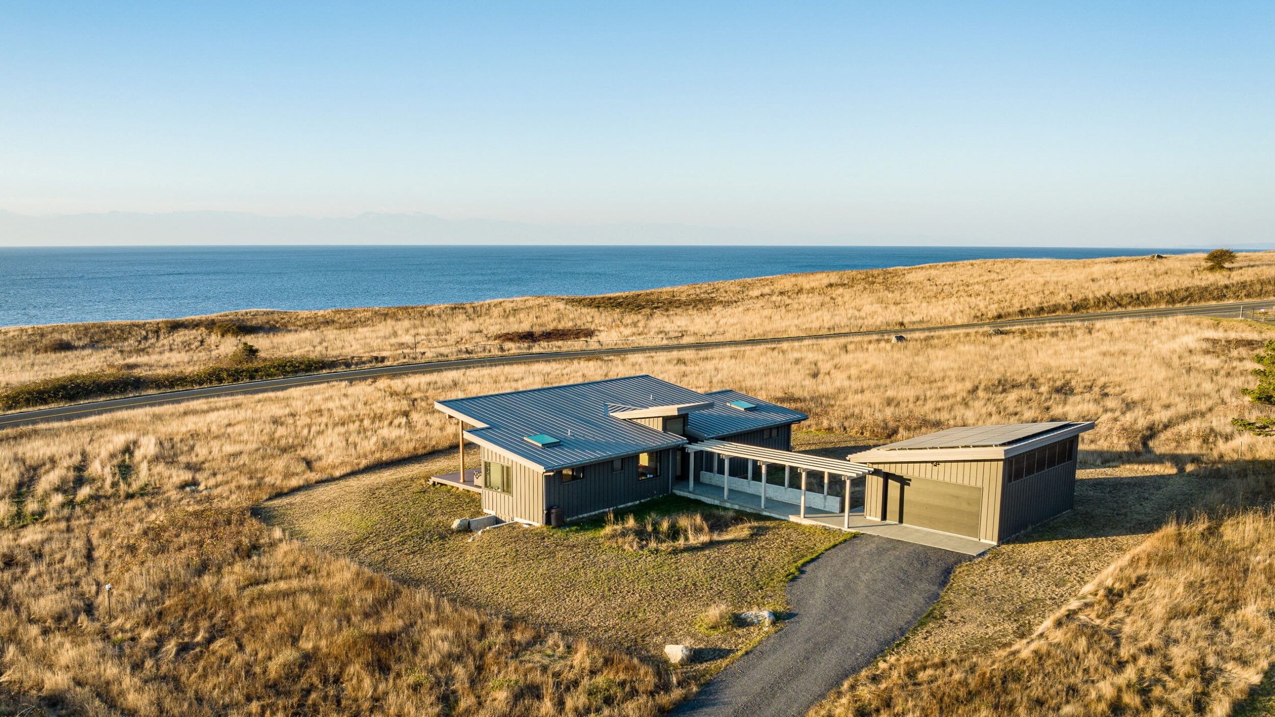 Cattle Point Cabin Aerial in San Juan Islands, Custom Home Design by BellCraft Architects