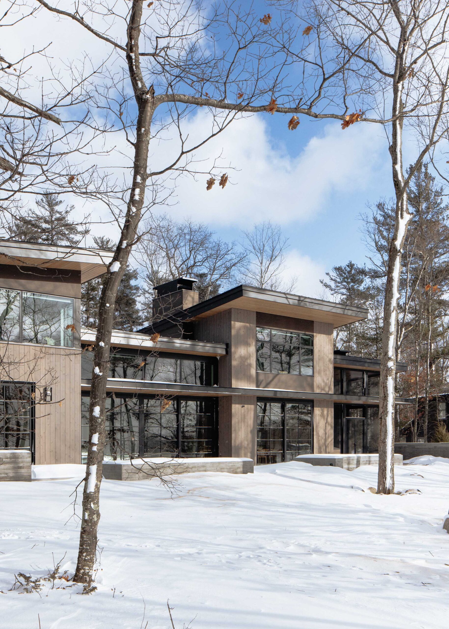 Bowers Harbor Lake House Exterior in Northern Michigan, Custom Home Design by BellCraft Architects